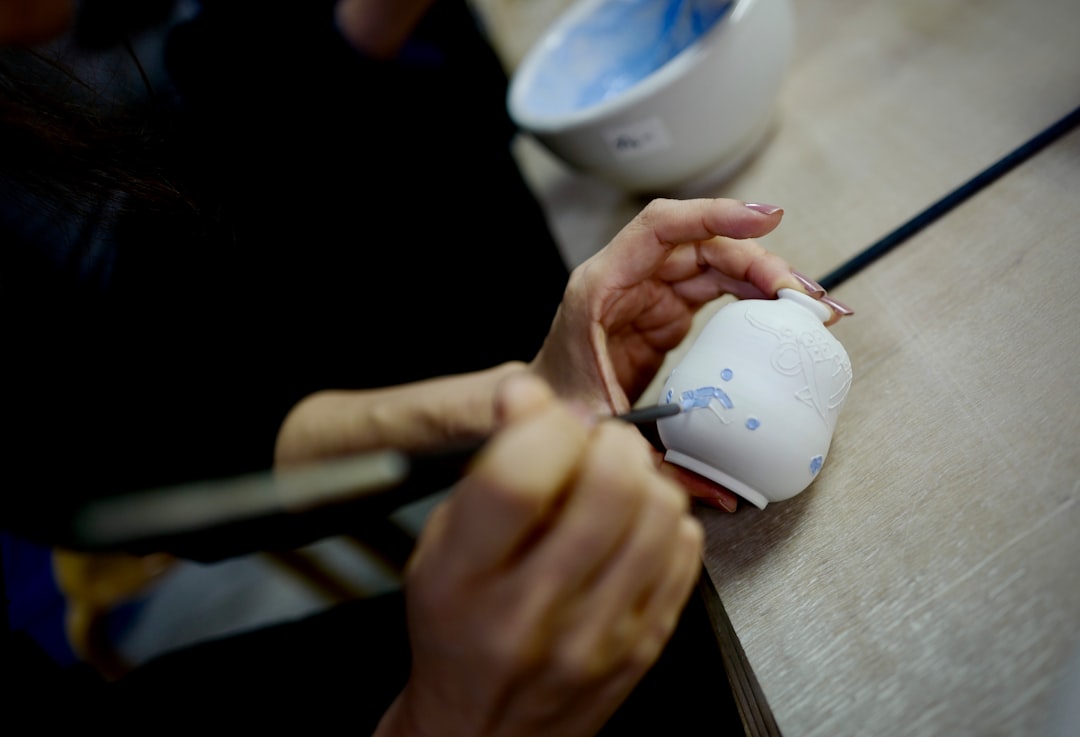 Glaze application showing brushstrokes and drips